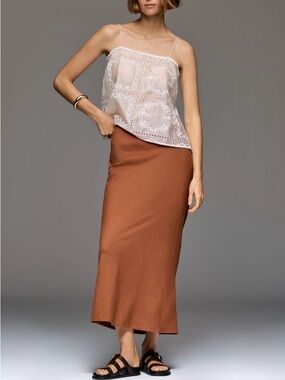 Think Anthropologie Tilda slip skirt.
Women’s small rust satin midi. Drawstring